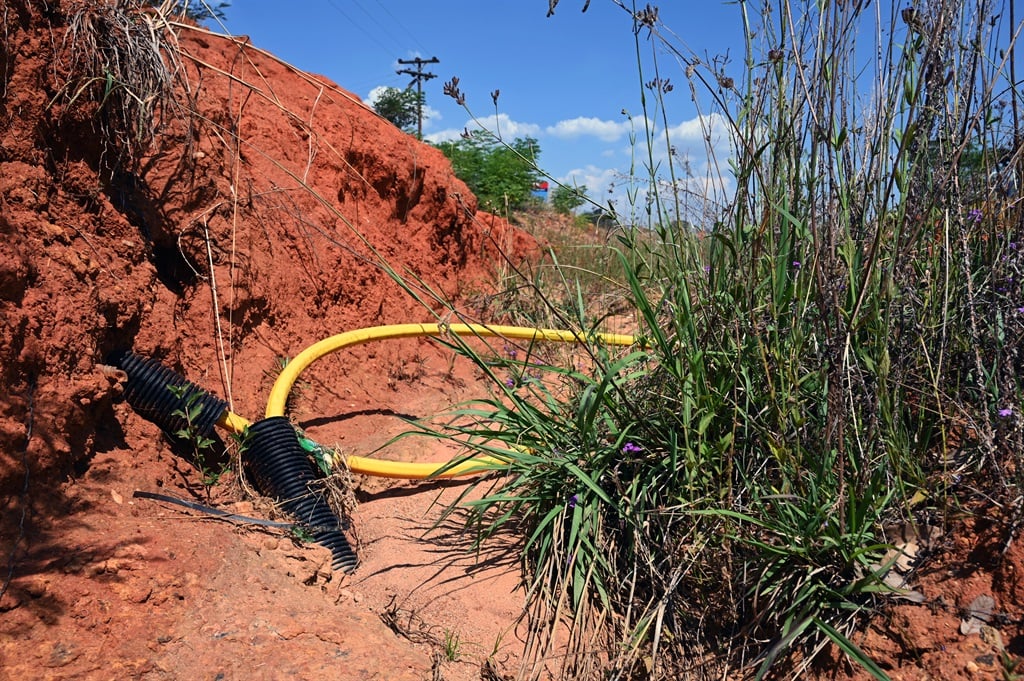 Exposed electrical cables remain uncovered