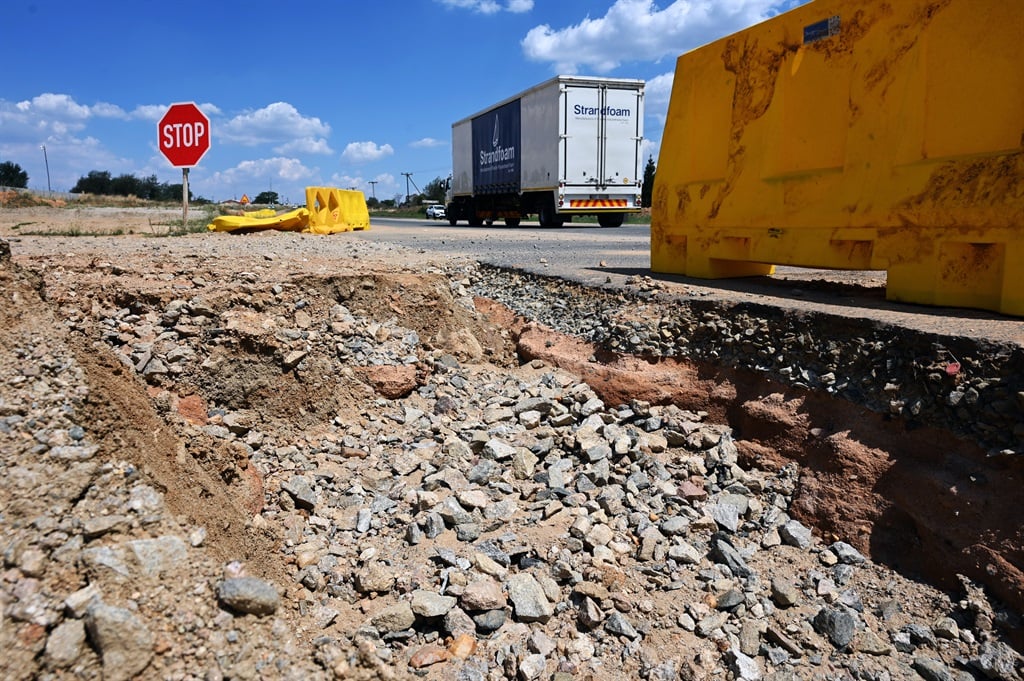 Rainwater deepens the deeply excavated site