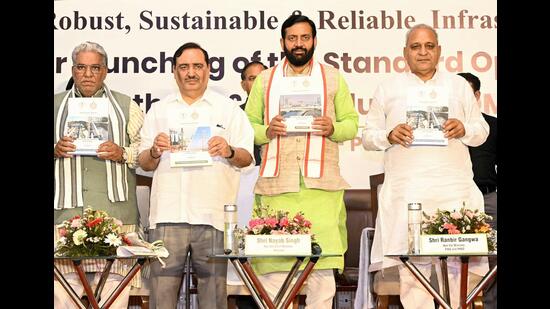 From left to the right development and Panchayat Minister Krishan Lal Panwar, the chairman of the quality assurance authority, Rajeev Arora, the Prime Minister of Haryana, Nayab Singh Saini, and public work, Ranbir Gangwa, during the event in Panchkula on Friday. (Collected) From left to the right development and Panchayat Minister Krishan Lal Panwar, the chairman of the quality assurance authority, Rajeev Arora, the Prime Minister of Haryana, Nayab Singh Saini, and public work, Ranbir Gangwa, during the event in Panchkula on Friday. (Collected)