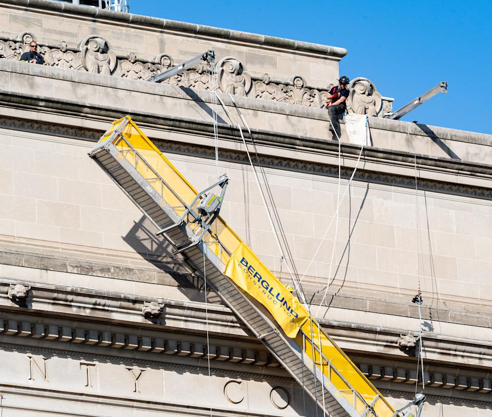 The Milwaukee fire brigade is trying to save two workers who were caught on a dangling scaffold on Thursday, October 10, 2024 in Milwaukee, WIS, in the courthouse of Milwaukee County.