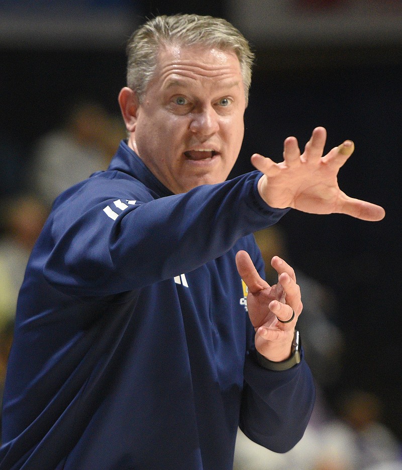 Matt Hamilton/ UTC basketball coach Dan Earl's personnel photo was received a six-year contract extension after the management of the program last season.