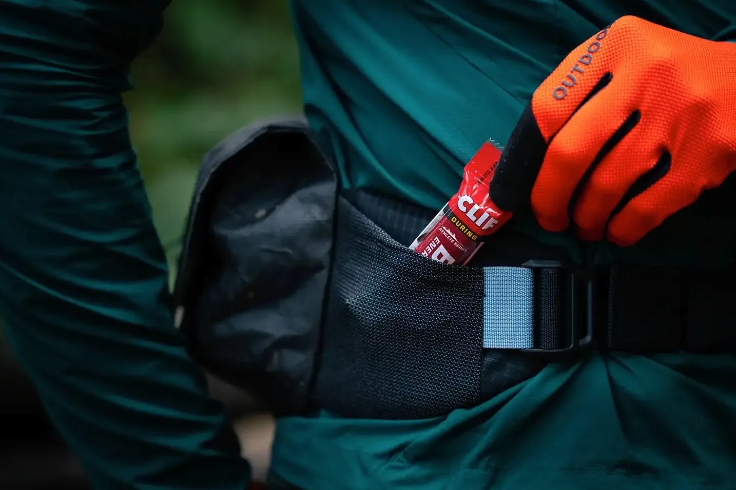 Pull a snack out of the hip winged pockets on the 3D hip pack