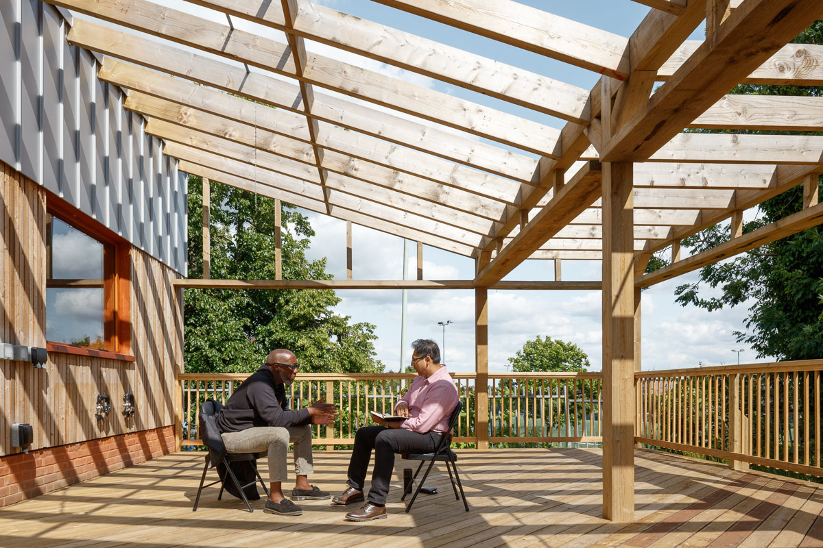 Wolves Lane Center, a common room in a wood, earth and other natural and sustainable materials