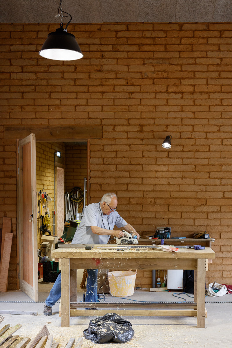 Wolves Lane Center, a common room in a wood, earth and other natural and sustainable materials