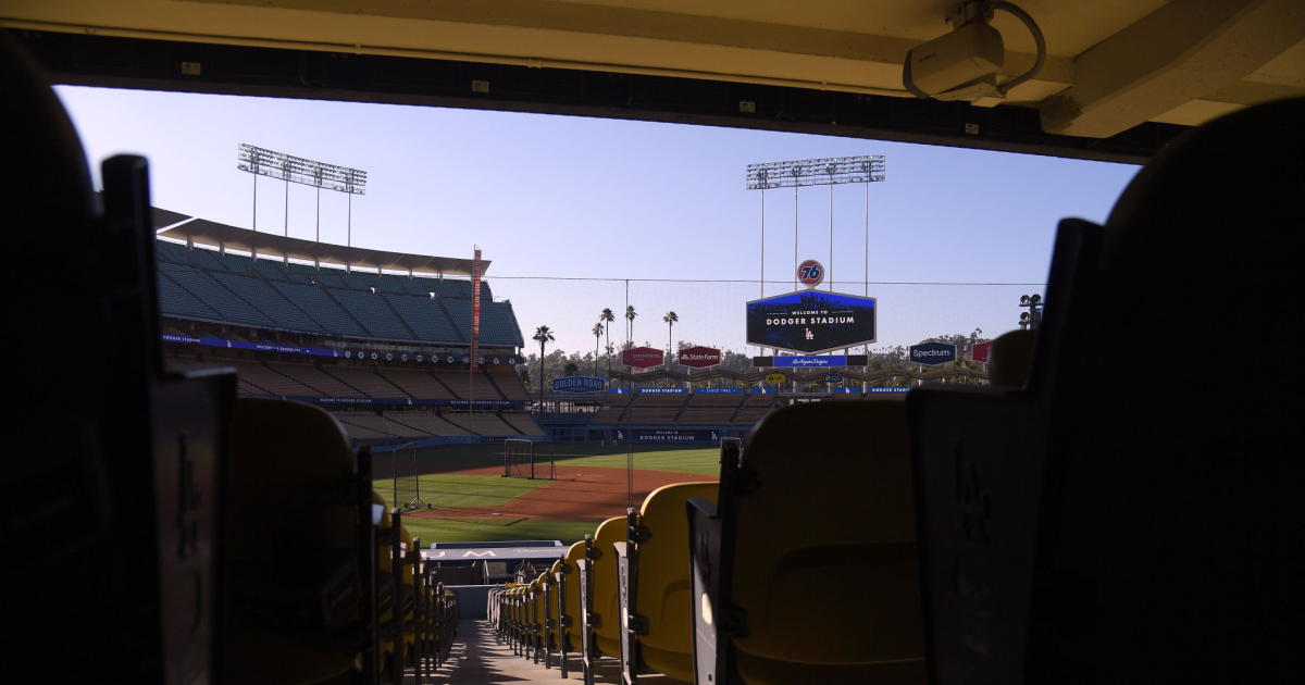 Dodgers checks the security of the stadium after the piece of concrete on the fan