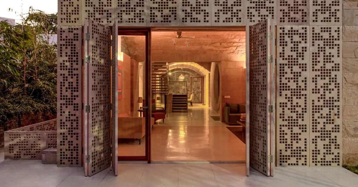 The lattice work ensures that light filters into the house without allowing the hard sun