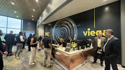 Guests check in at the lobby for the ribbon cutting ceremony of Viega's $178 million new manufacturing and training facility.