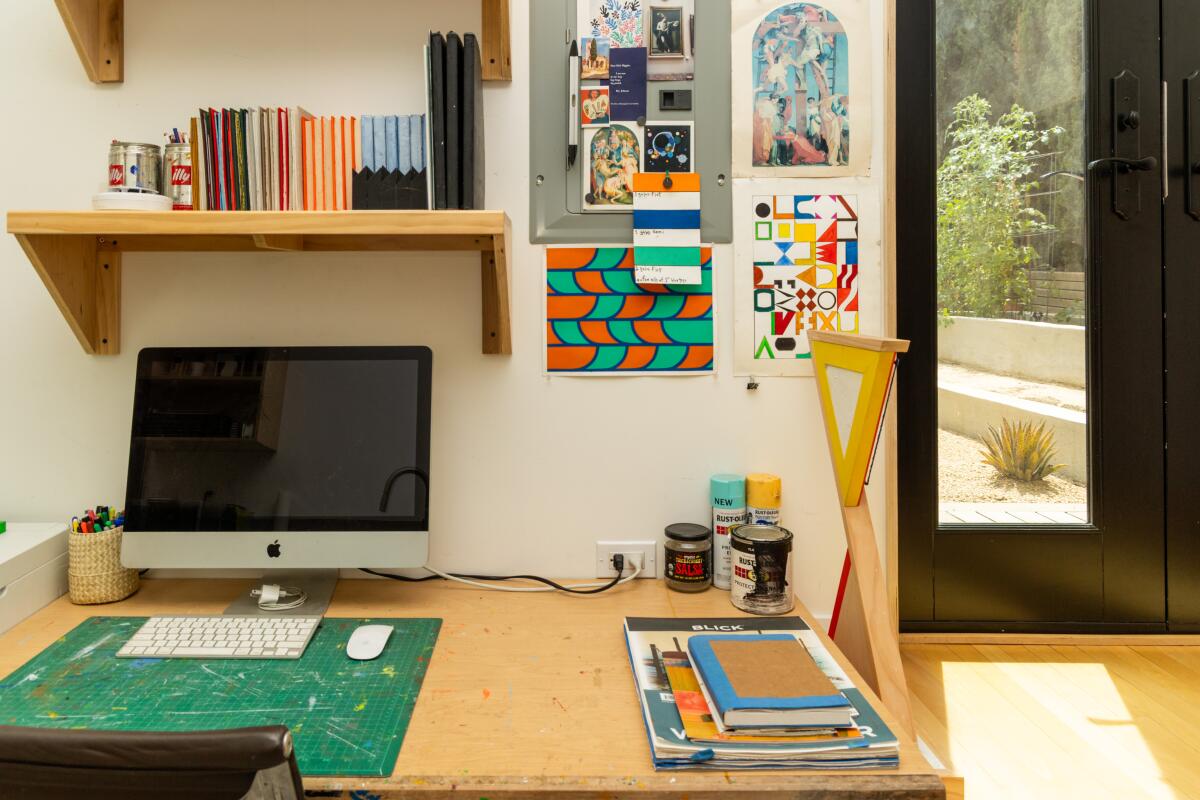 The ADU, attached to the garage and just six inches from the main house, has a kitchen, bathroom and living area. Puleo uses it as part of his art studio.
