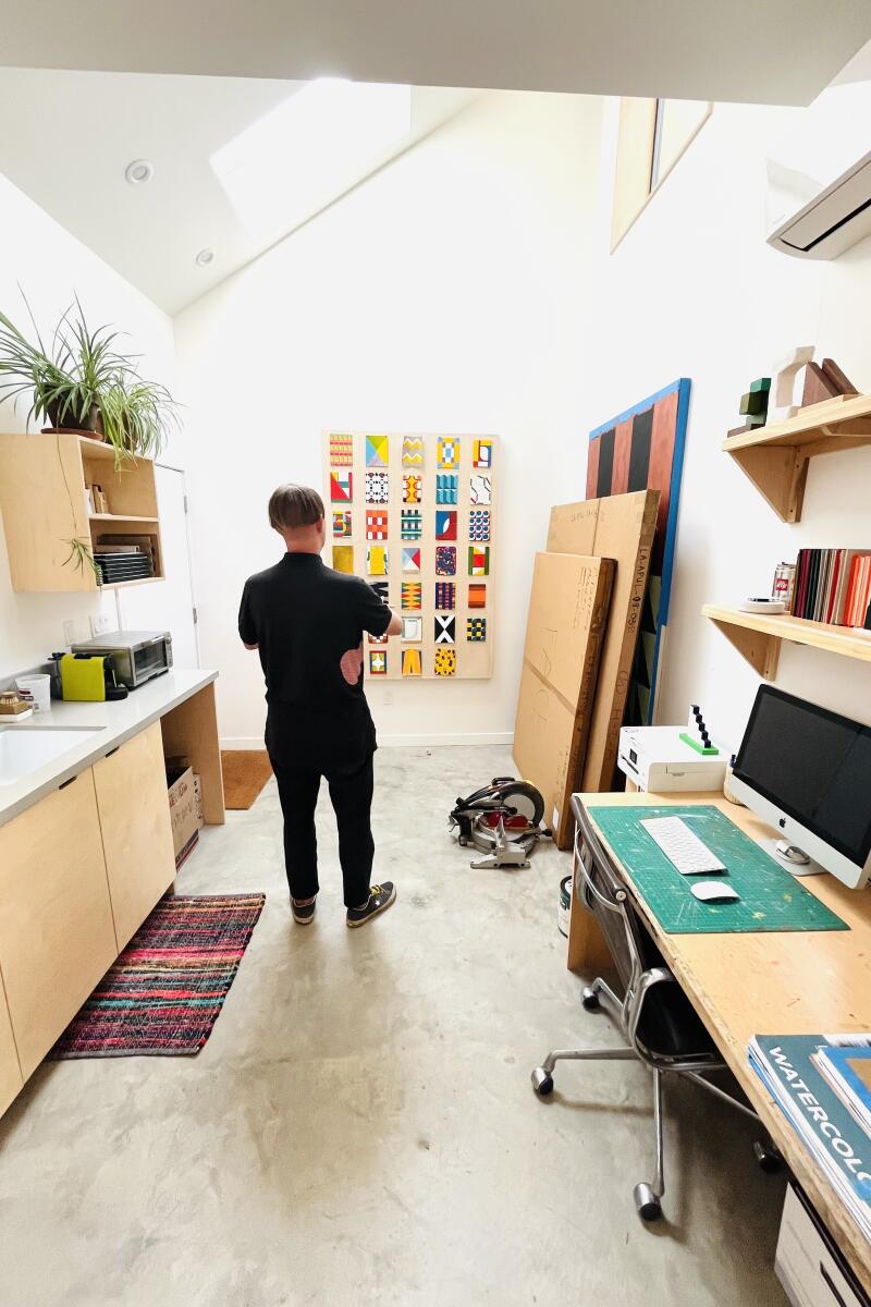 Designer Ben Warwas stands in the 250 square meter ADU.
