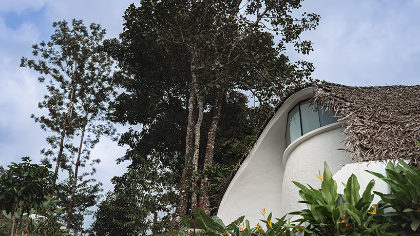 Organic straw and clay shell roof, sculptural eco retreat in India