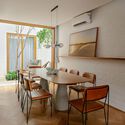 House MA / Rua 141 Arquitetura - Interior photography, dining room, wood, table, chair