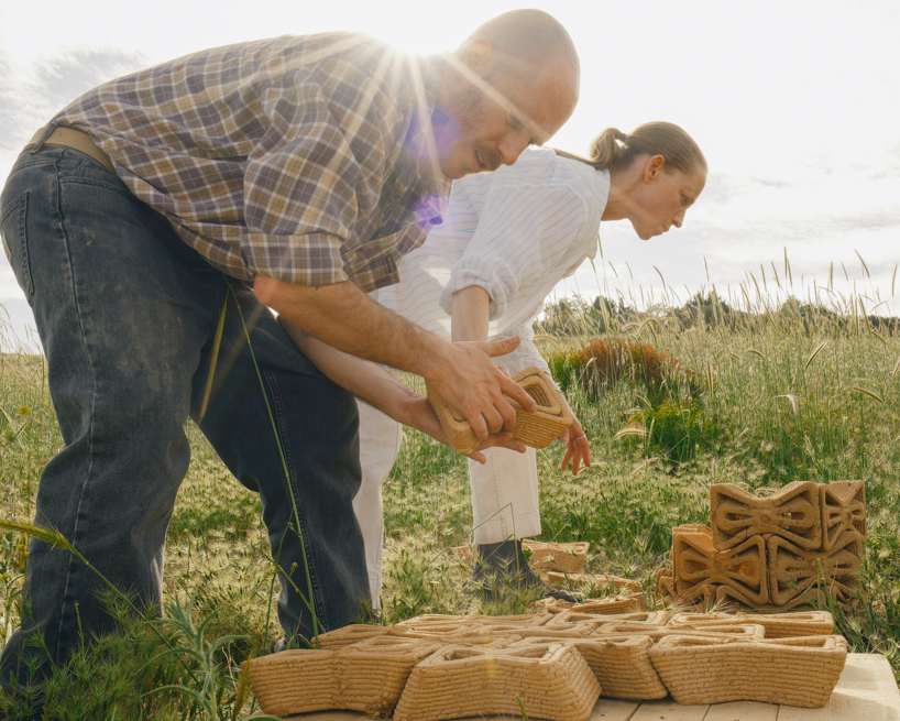 3D printed interlocking bricks form an earthen microclimate shelter for tree seedlings