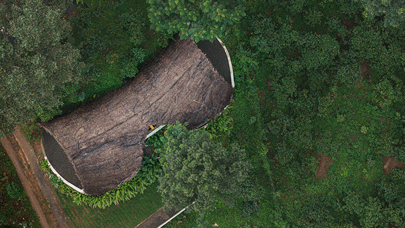 Organic straw and clay shell roof, sculptural eco retreat in India