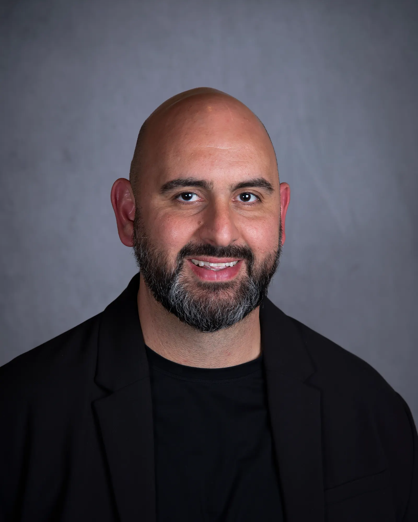 Headshot by Tony Qorri.